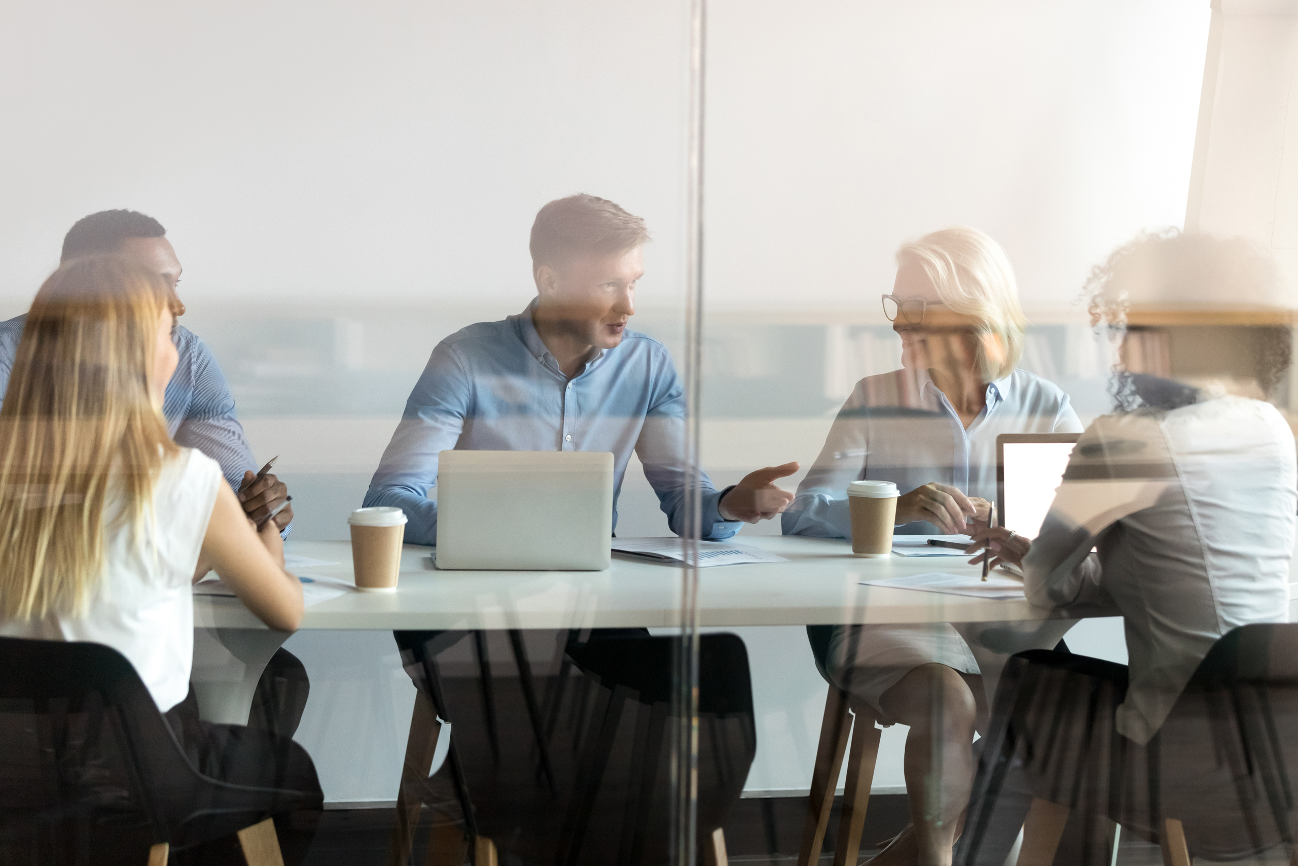 A group of professionals having a meeting in an office.